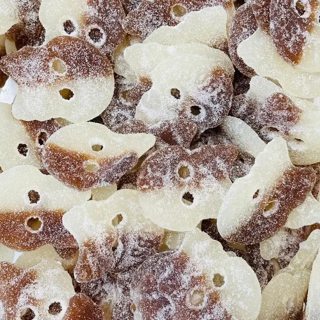 Brown and white sugar-coated skull-shaped foam candies