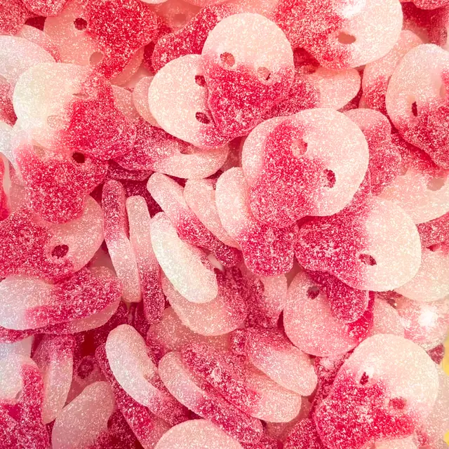 Pink and white sugar-coated skull-shaped gummies