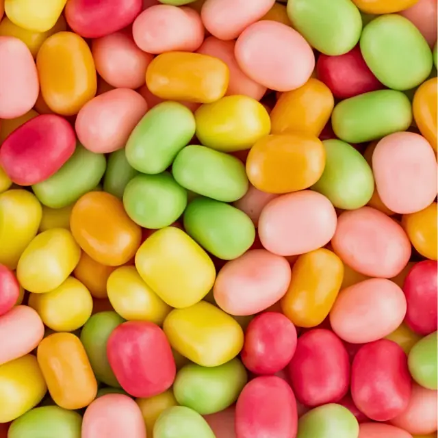 Pink, red, orange, yellow, and green candy-coated MAOAM chews