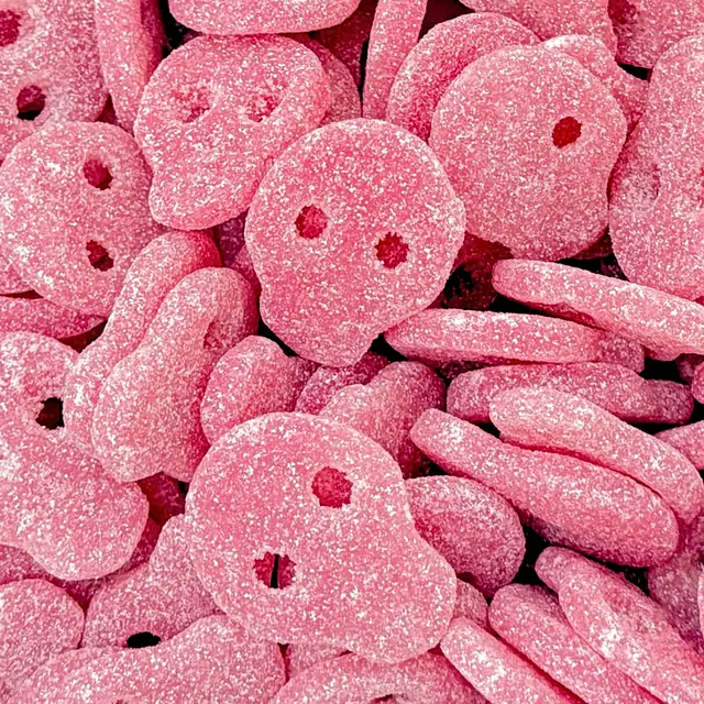 Pink sugar-coated skull-shaped gummies