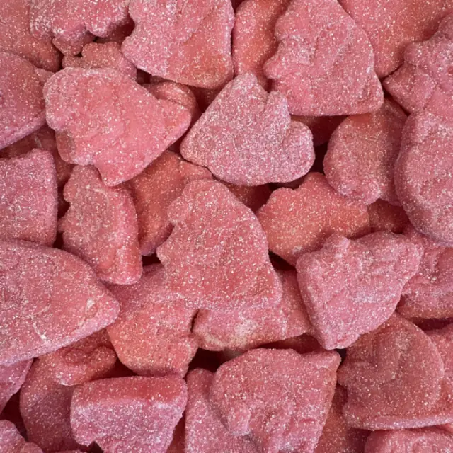 Pink sour foam candies shaped like monkeys