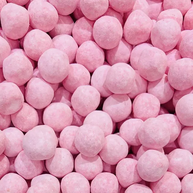 Round pink dusted strawberry bonbons