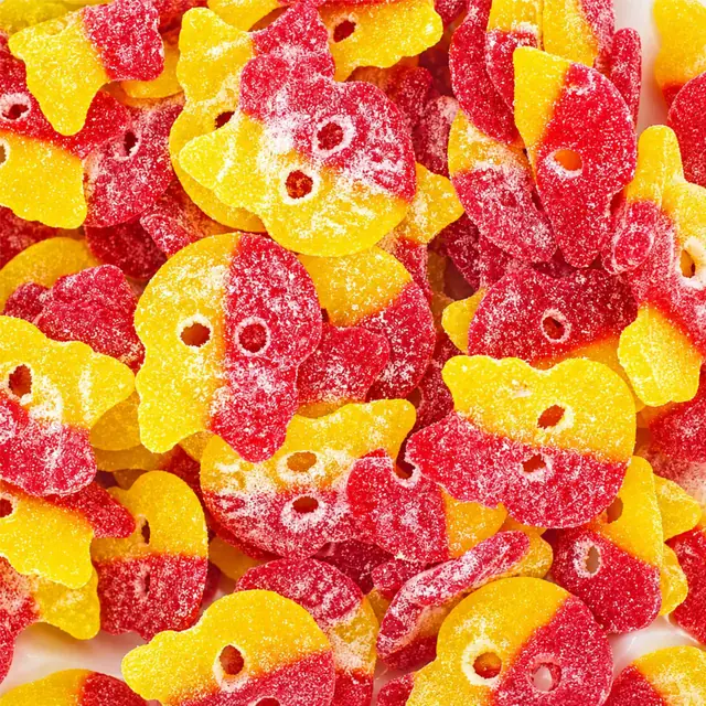 Red and yellow sugar-coated skull-shaped gummies